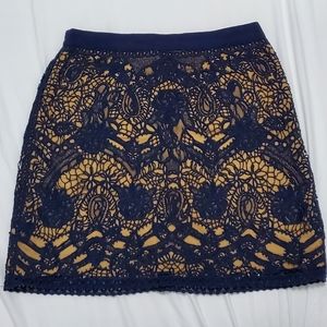 Club Monaco navy lace skirt with tan overlay